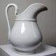 Antique white earthenware toilet jug from Pexonne, France