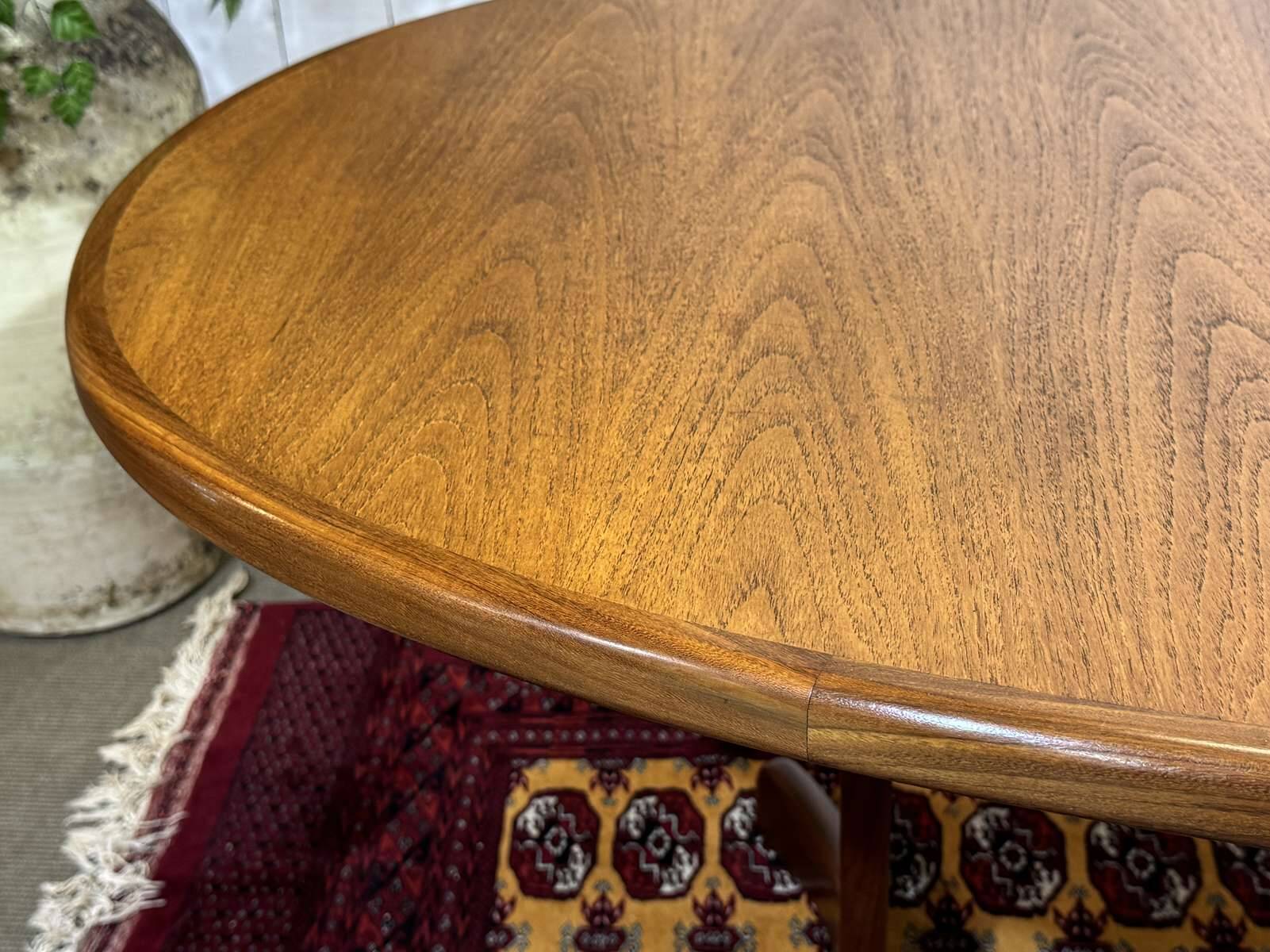 G-Plan oval teak table from the 1970s with a butterfly extension.