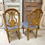 Paire de chaises style Louis XVI en bois doré