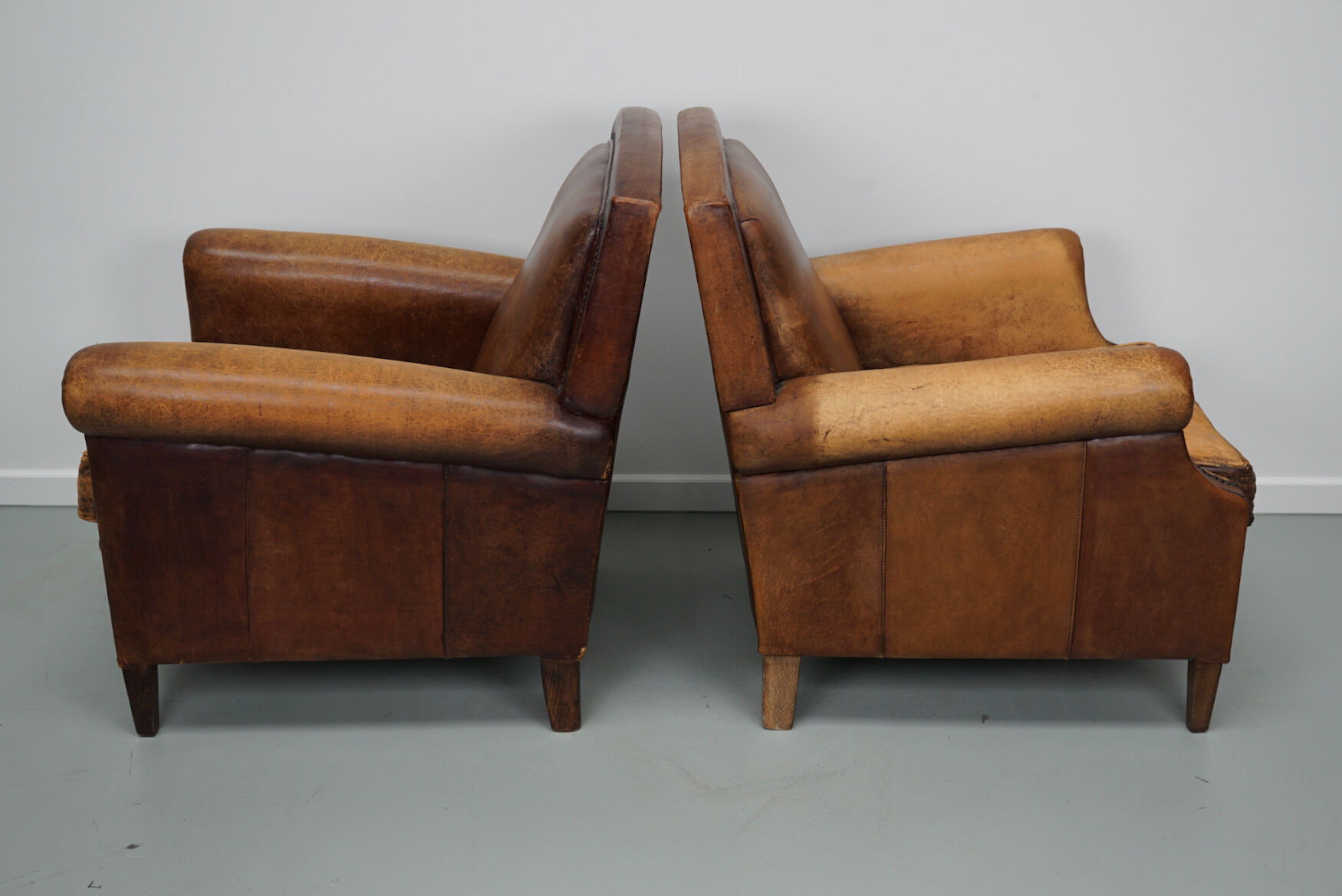 Vintage dutch cognac colored leather club chairs