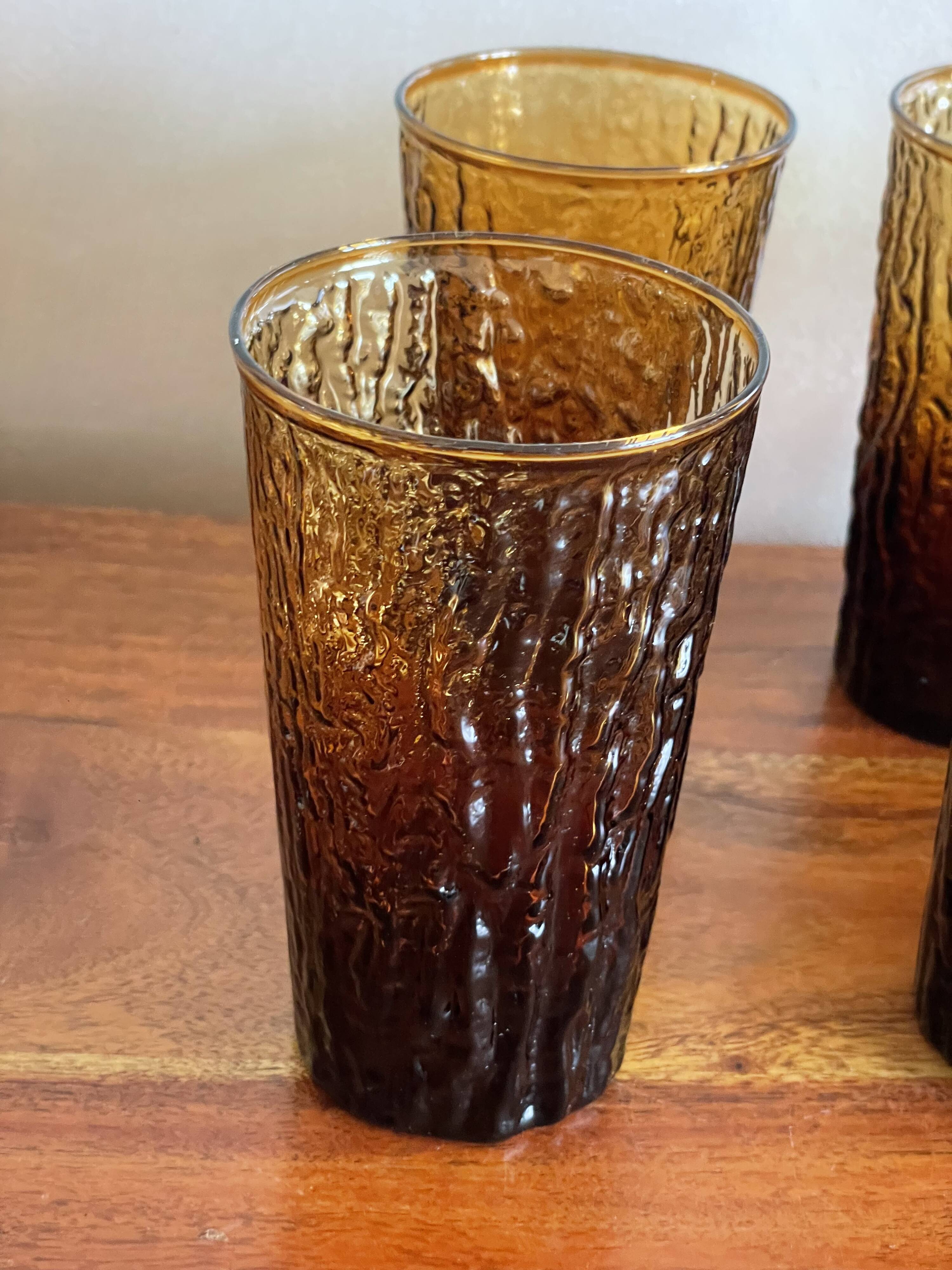 6 orangeade glasses with tree bark