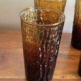 6 orangeade glasses with tree bark