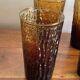 6 orangeade glasses with tree bark