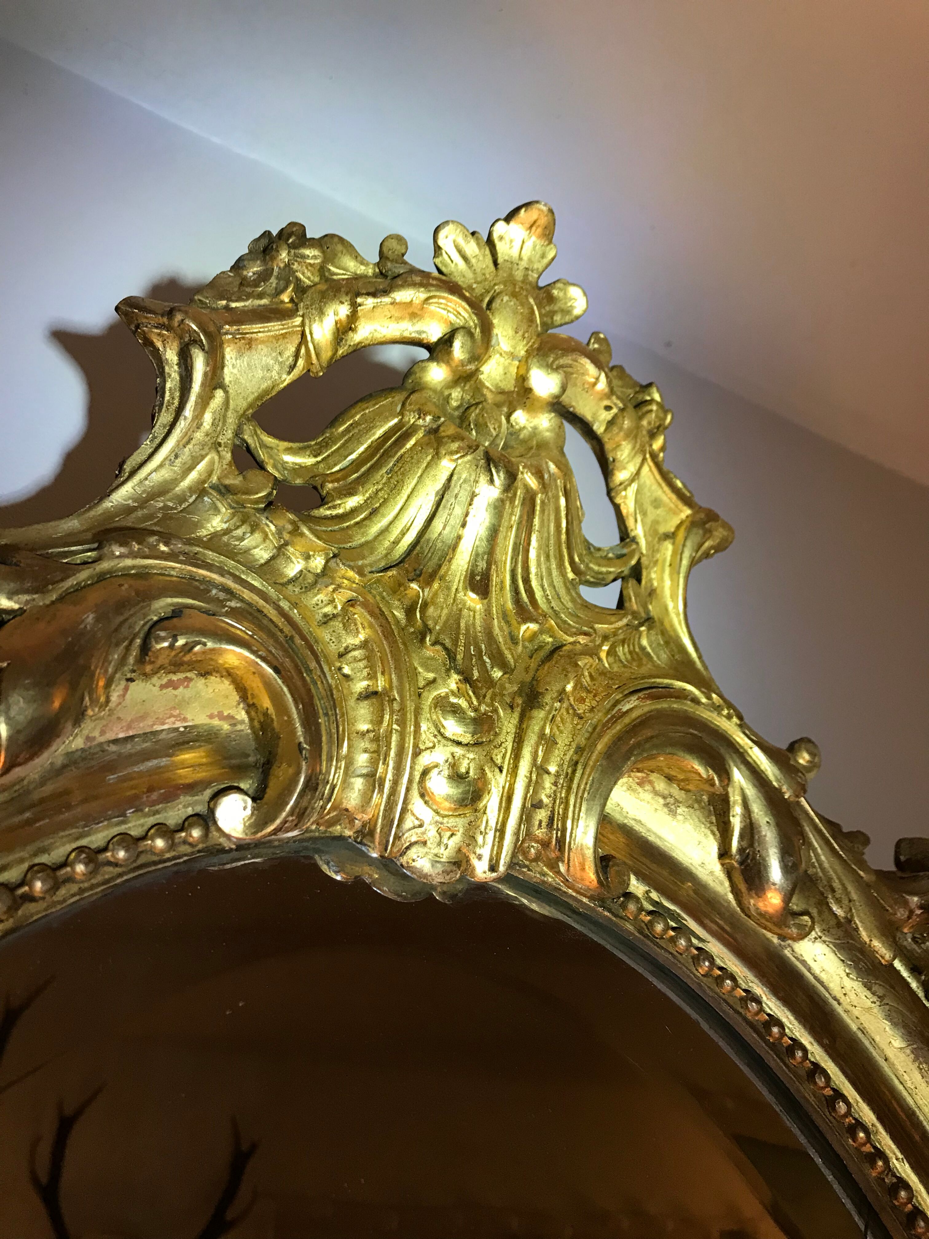 Oval mirror Louis XVI gold leaf
