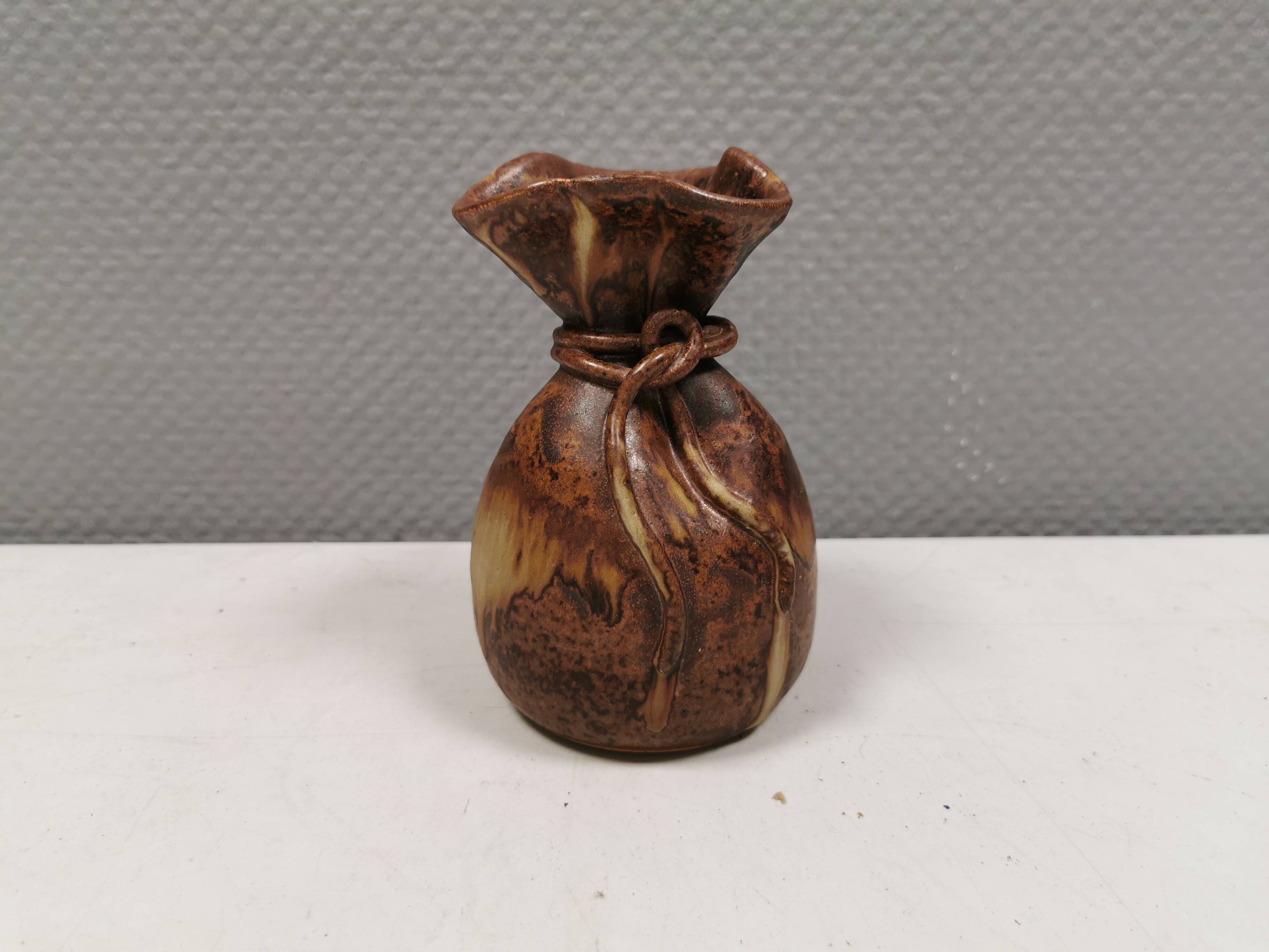 vase shaped like a money bag, in beautiful earthy colours.