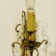 Brass wall light with glass pendants from the mid-20th century.