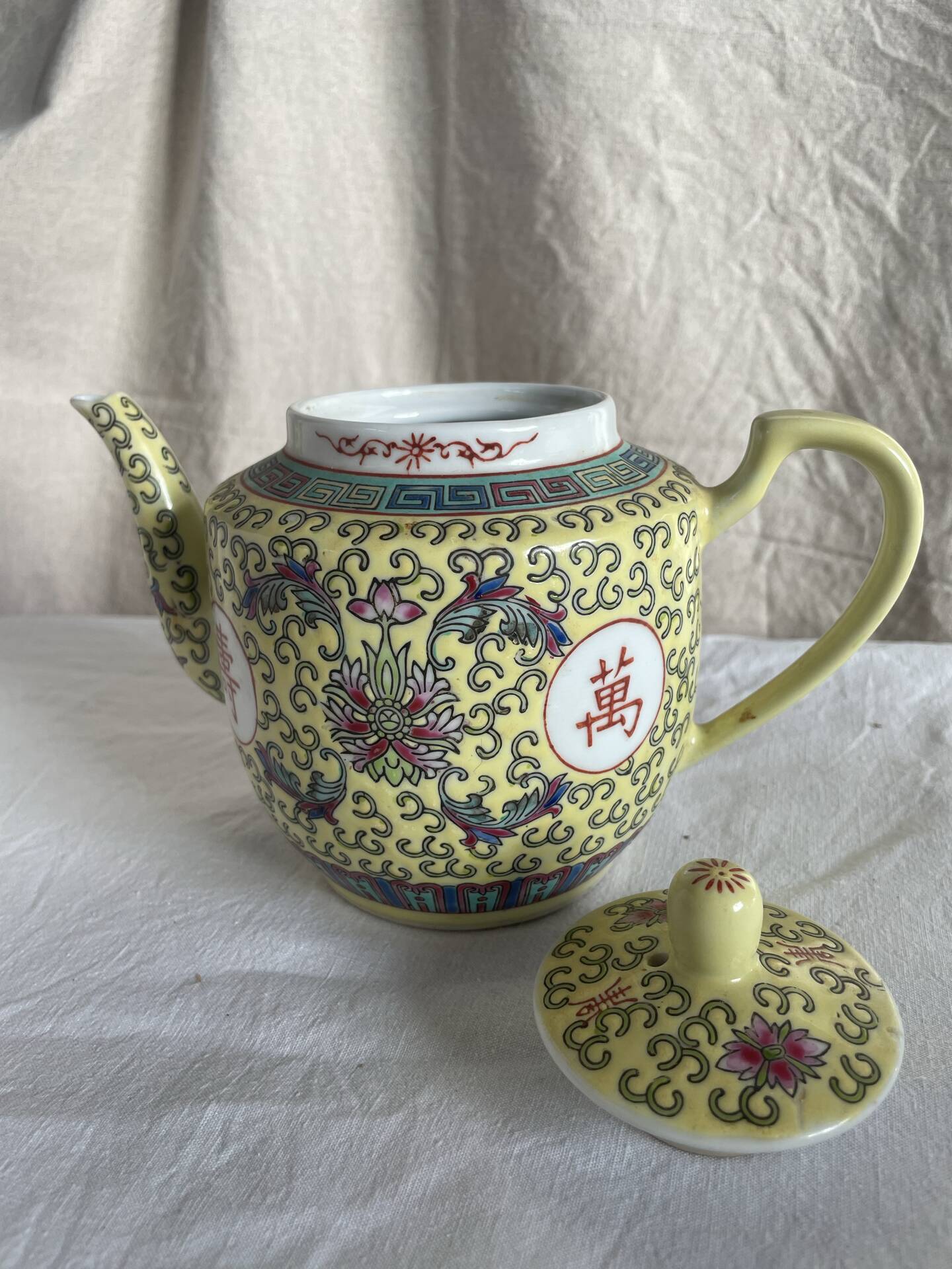 Chinese porcelain teapot with floral pattern