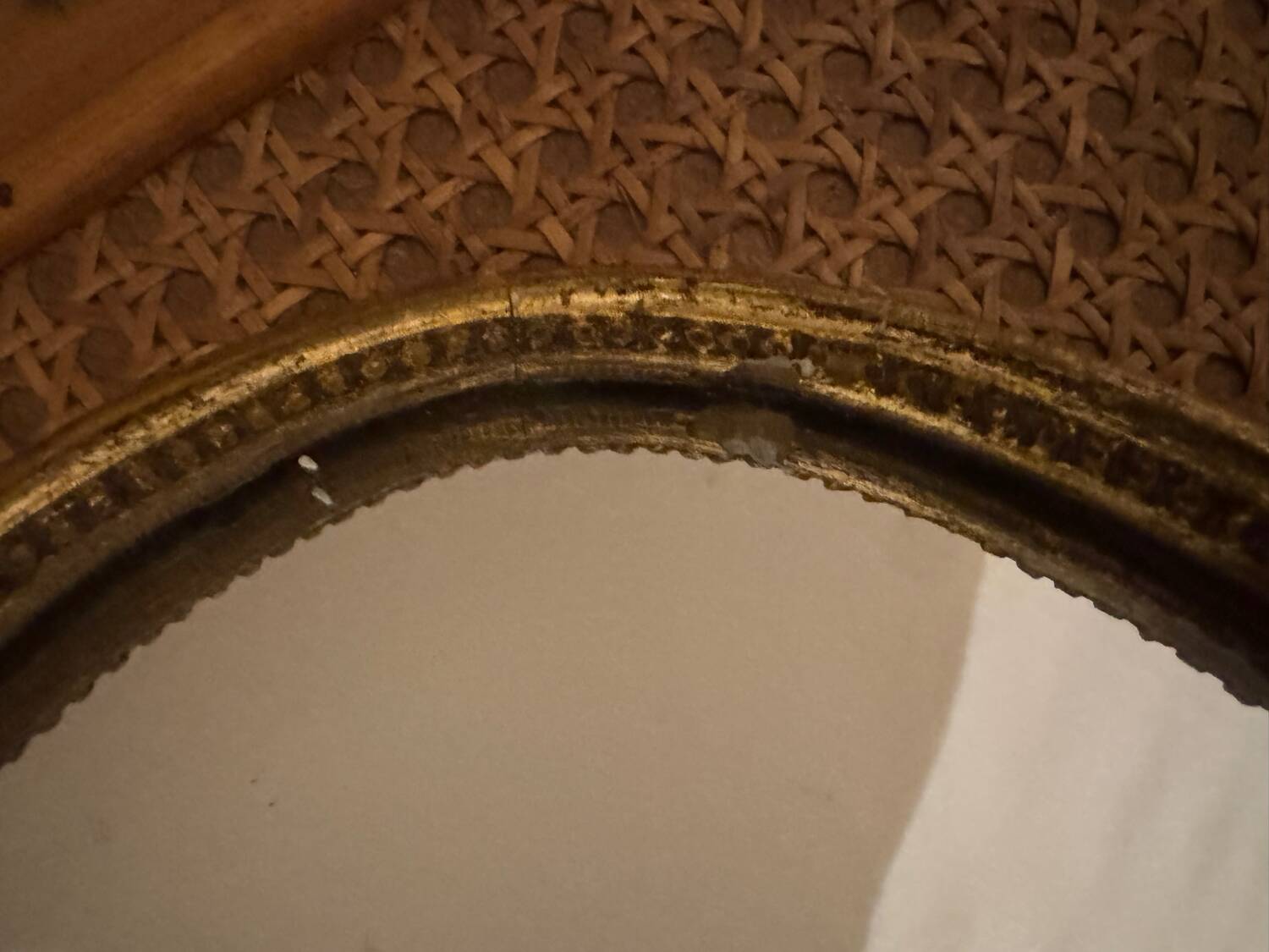 Oval gold knot mirror