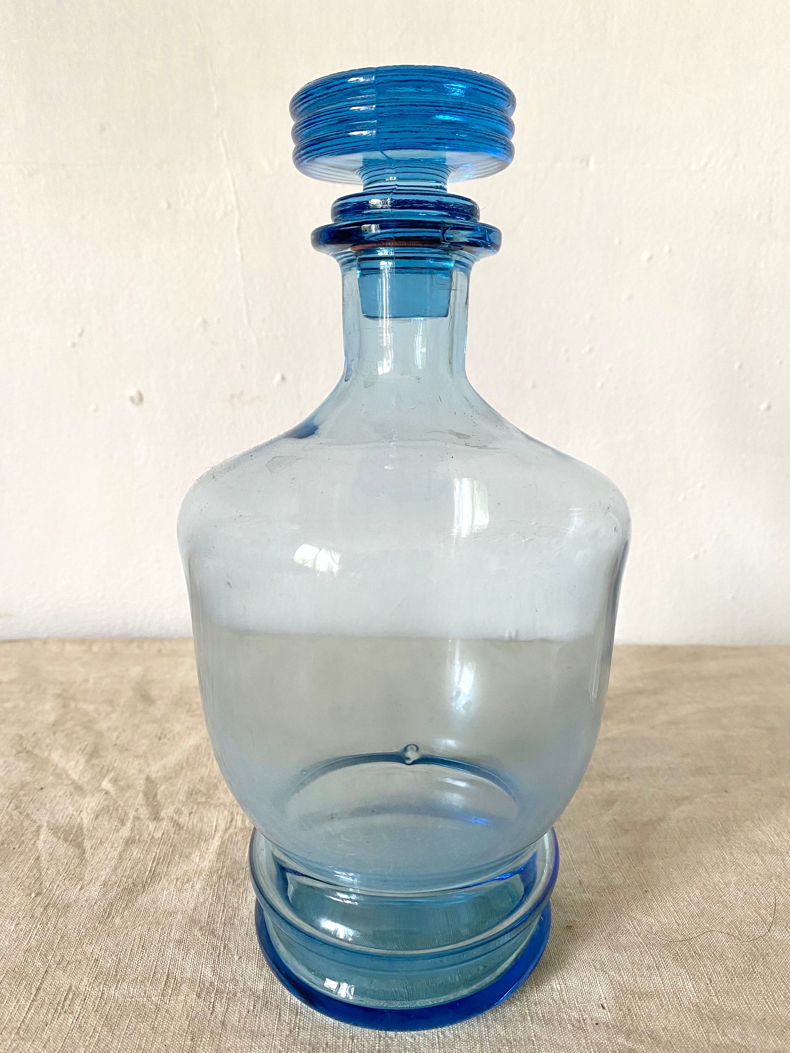 Antique carafe in blue glass