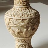 Chinese Baluster Vase. In beige cinnabar lacquer. Dimensions: 17 x 9 cm