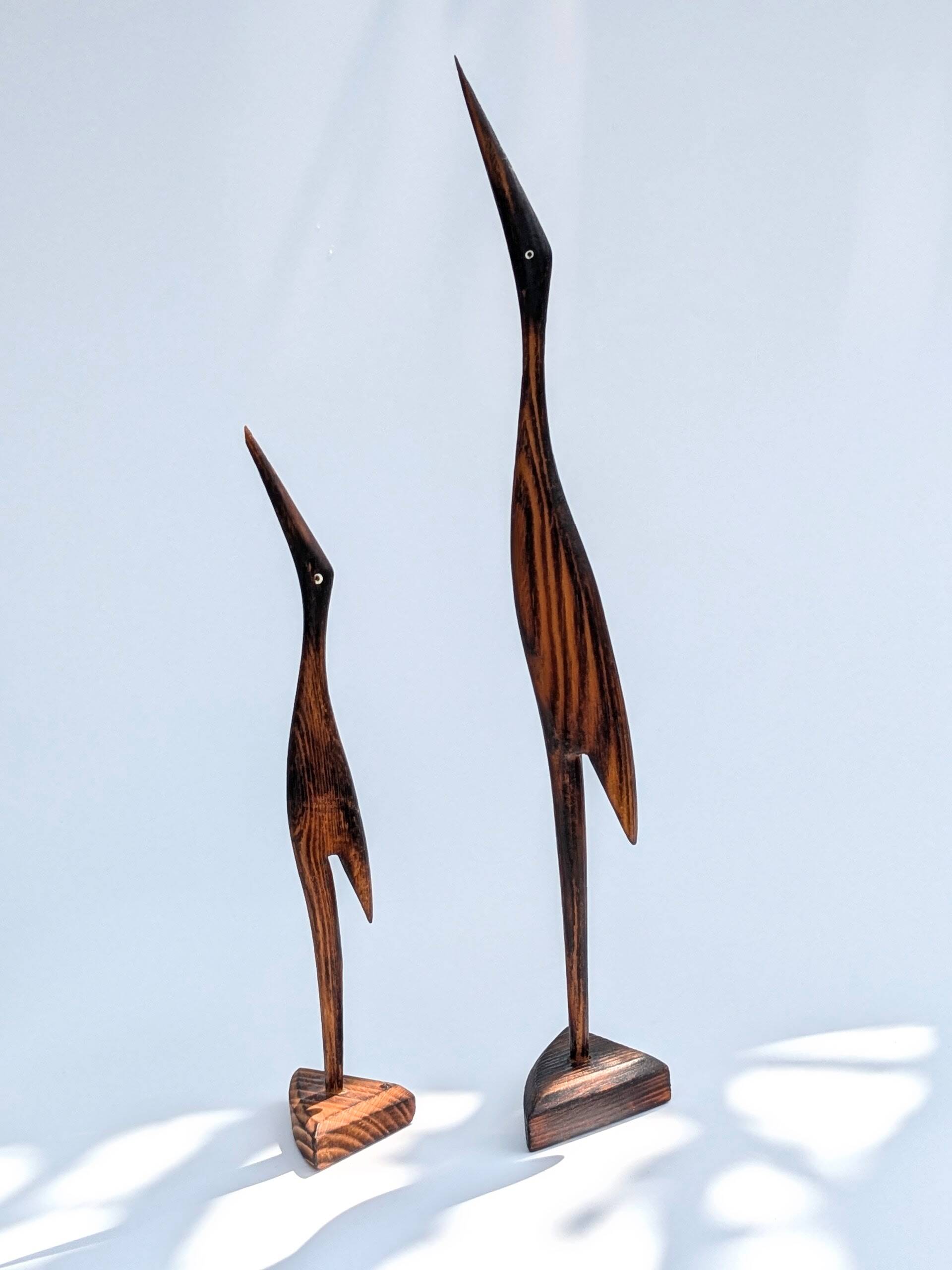 Paire de grues en bois, années 60