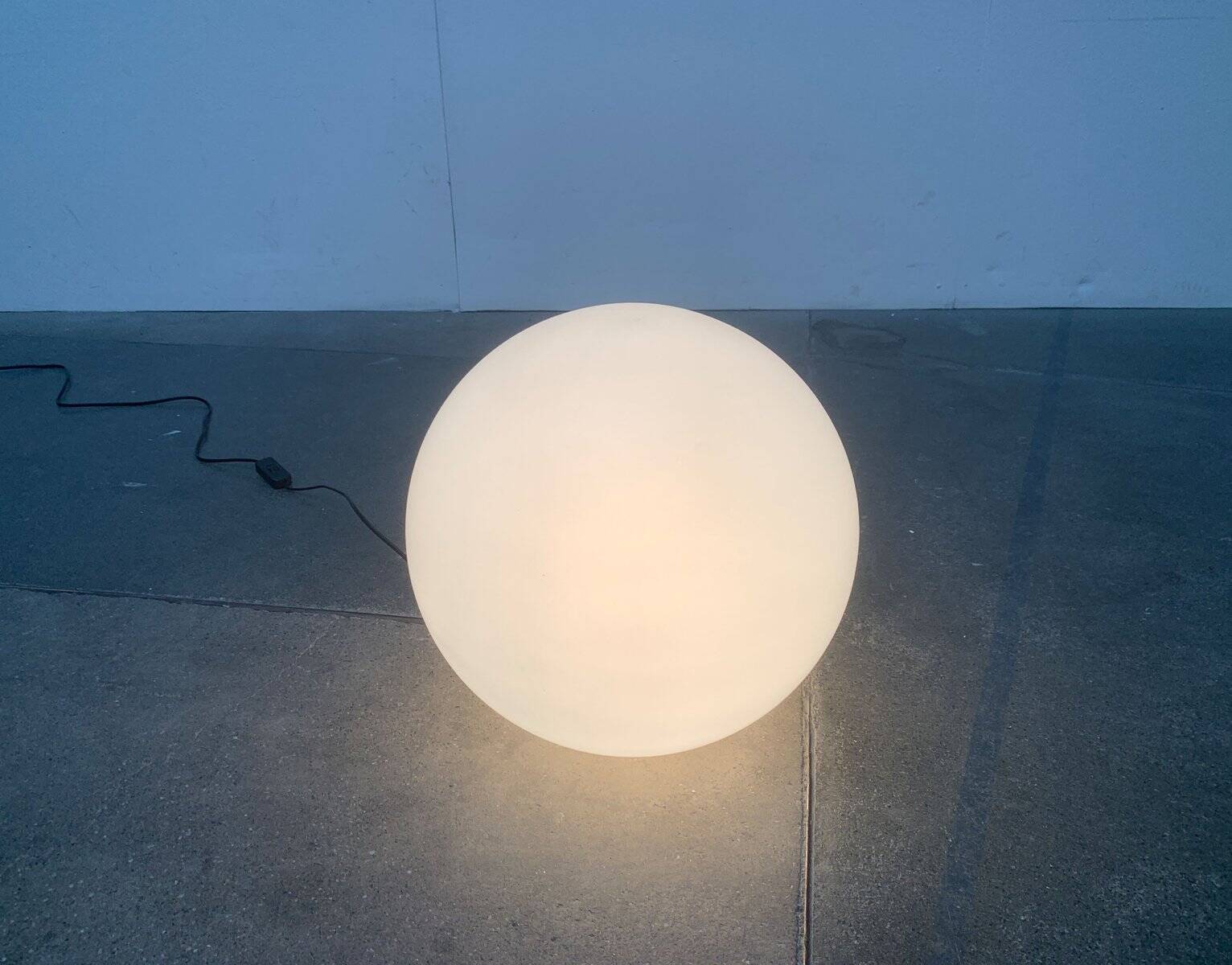 Vintage floor lamp in the shape of a globe from the French space age by SCE, France.