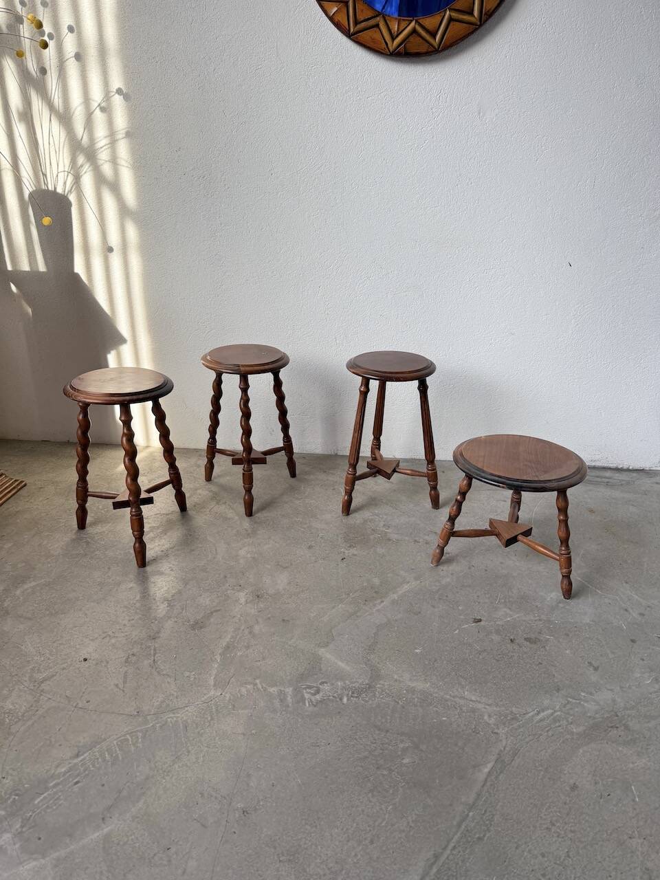 Set of 4 turned oak stools.