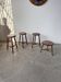 Set of 4 turned oak stools.