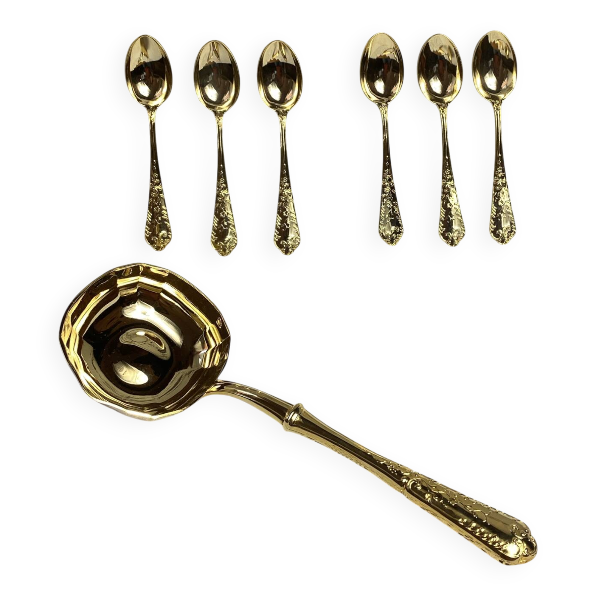 Dessert spoons and serving ladle