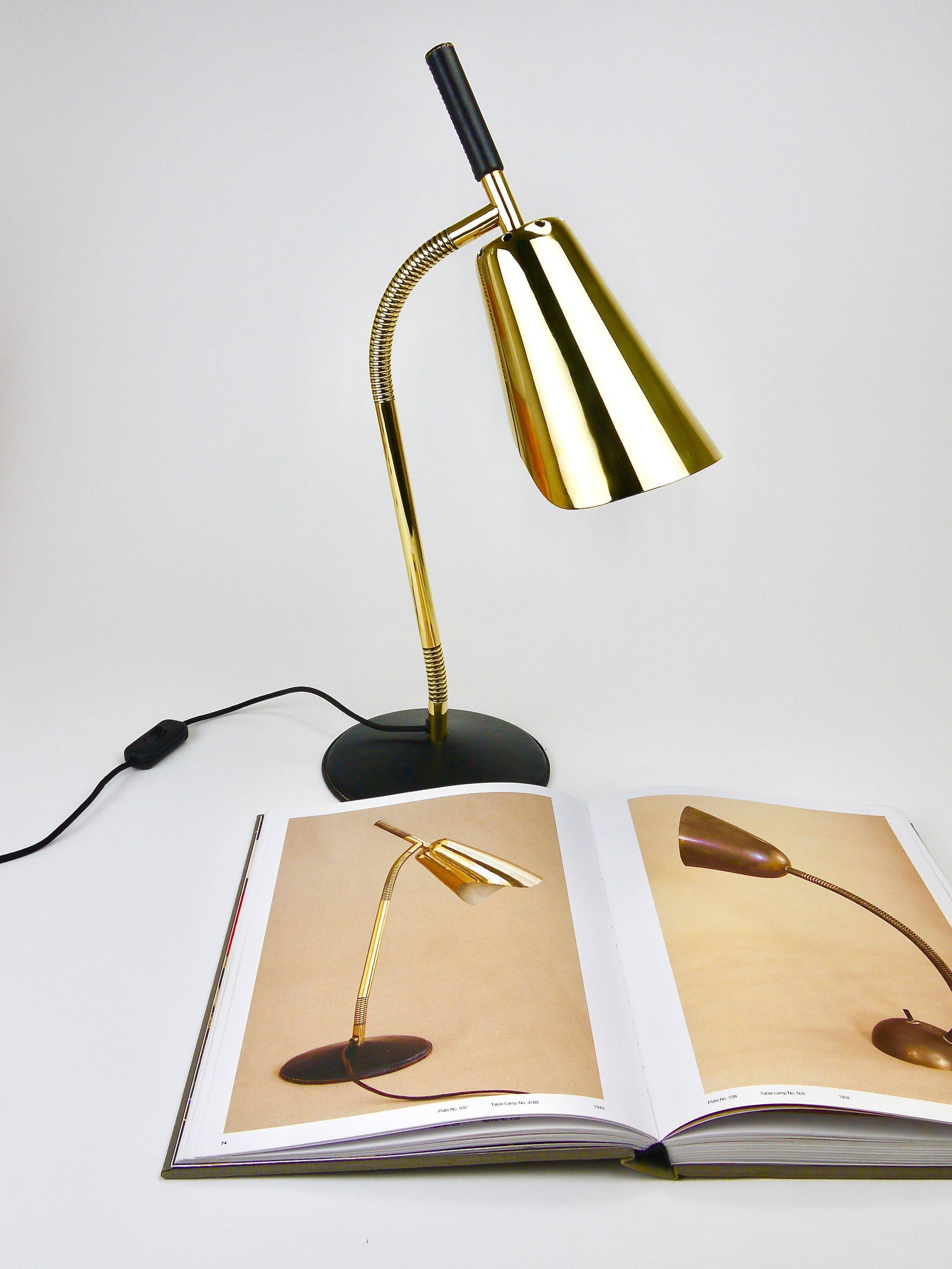 Rare desk and table lamp in brass and leather by Carl Aubock II #4280, Vienna, Austria.