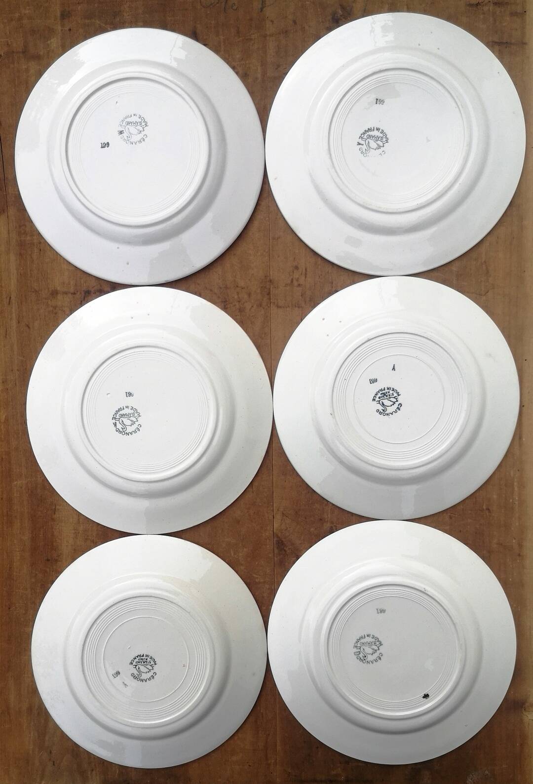 Old flat plates, in earthenware, Céranord St Amand factory