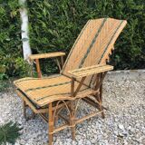 Rattan lounger with foot rest