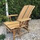 Rattan lounger with foot rest