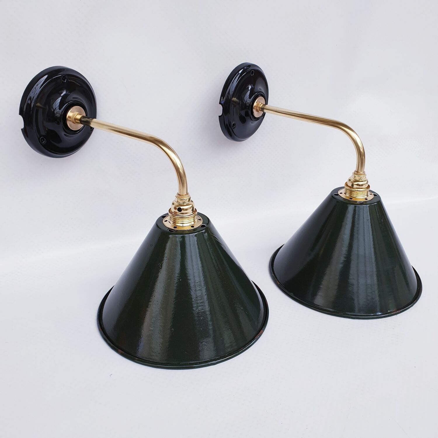 Pair of antique enamelled sheet metal wall lights