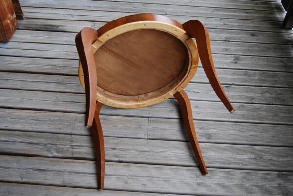 Table basse art déco de forme ronde en palissandre de rio.
