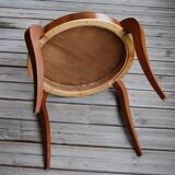 Table basse art déco de forme ronde en palissandre de rio.