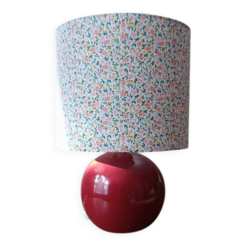 Red bedside lamp, liberty lampshade with small pink flowers.