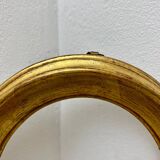 Old oval shaped wooden frame