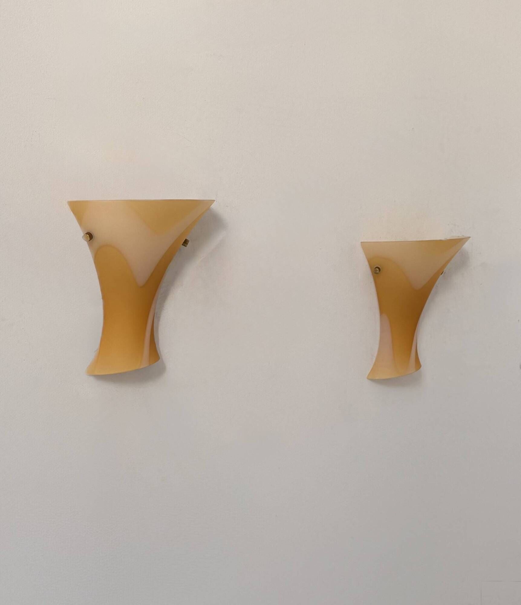 Pair of vintage wall lights with orange glass and brass, Italy 1980.