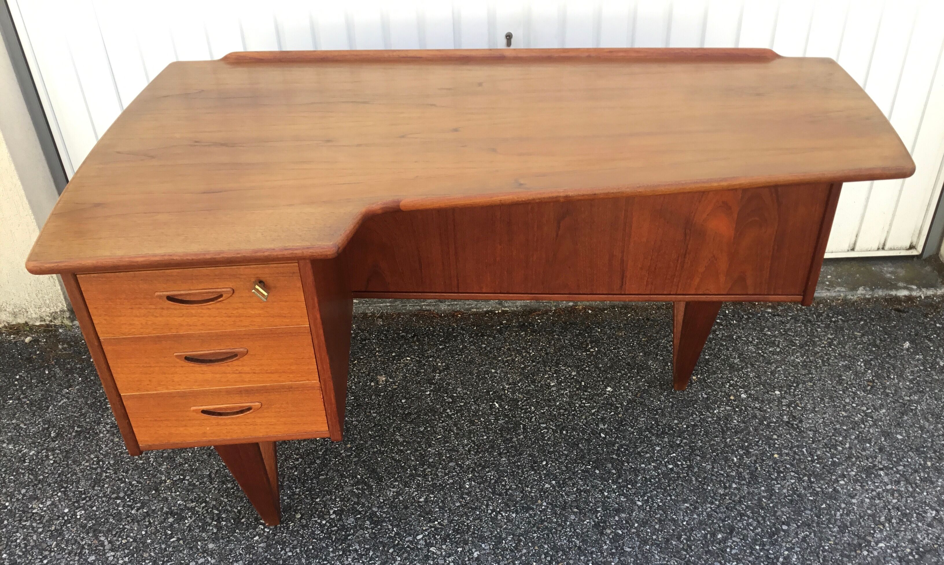 Peter Lovig Nielsen's Scandinavian teak boomerang desk from the 60s
