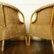 Paire de fauteuils à jupe en rotin & osier