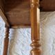 Nineteenth-century walnut work table with flaps, large storage + secret drawer.