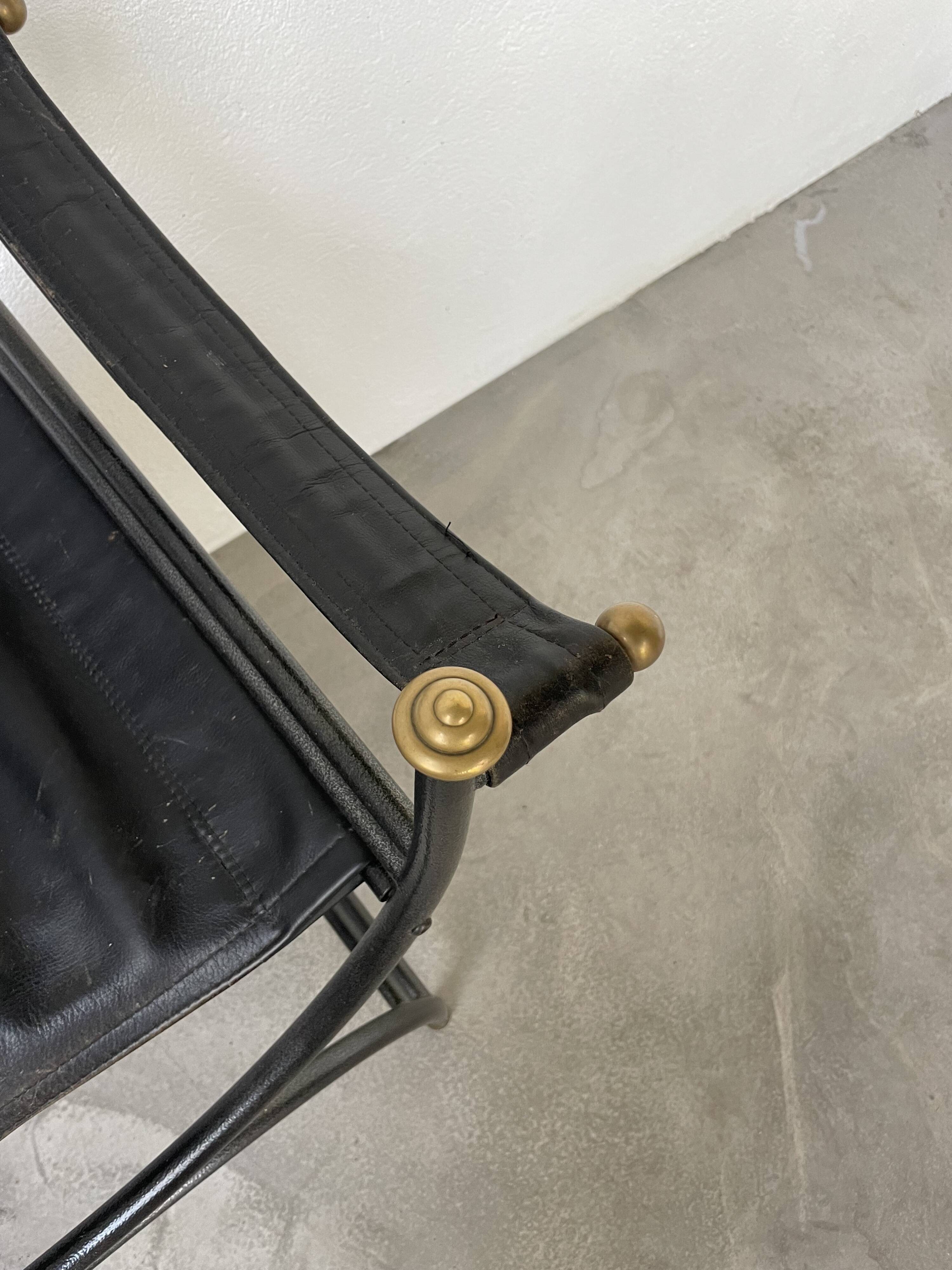 Pair of leather “curule” emperor armchairs