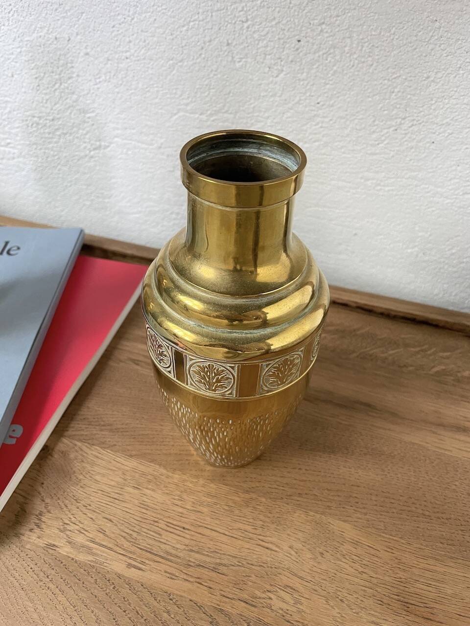 Duo of embossed brass vases