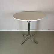 Vintage round white chrome dining table from the 70s.