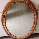 Oval mirror with woven rattan frame 63x47