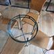 Glass and metal table and its 4 wicker chairs and glass Roche Bobois