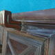 Wall-mounted coat rack in solid oak with 9 hooks.