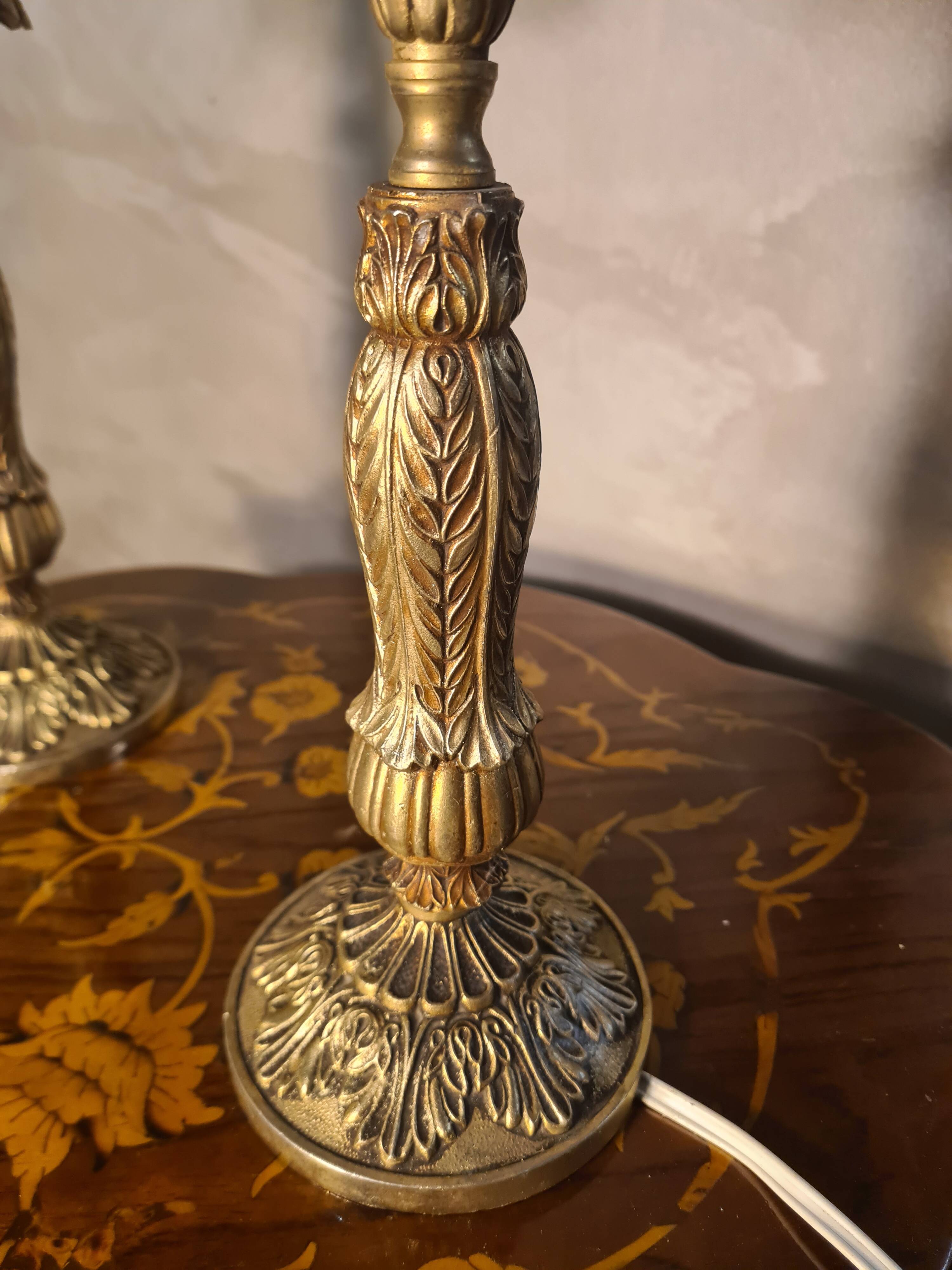 pair of bedside lamps in gilded bronze with glass shade