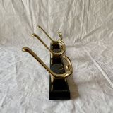 Vintage coat rack in lacquered metal with three golden aluminum hooks