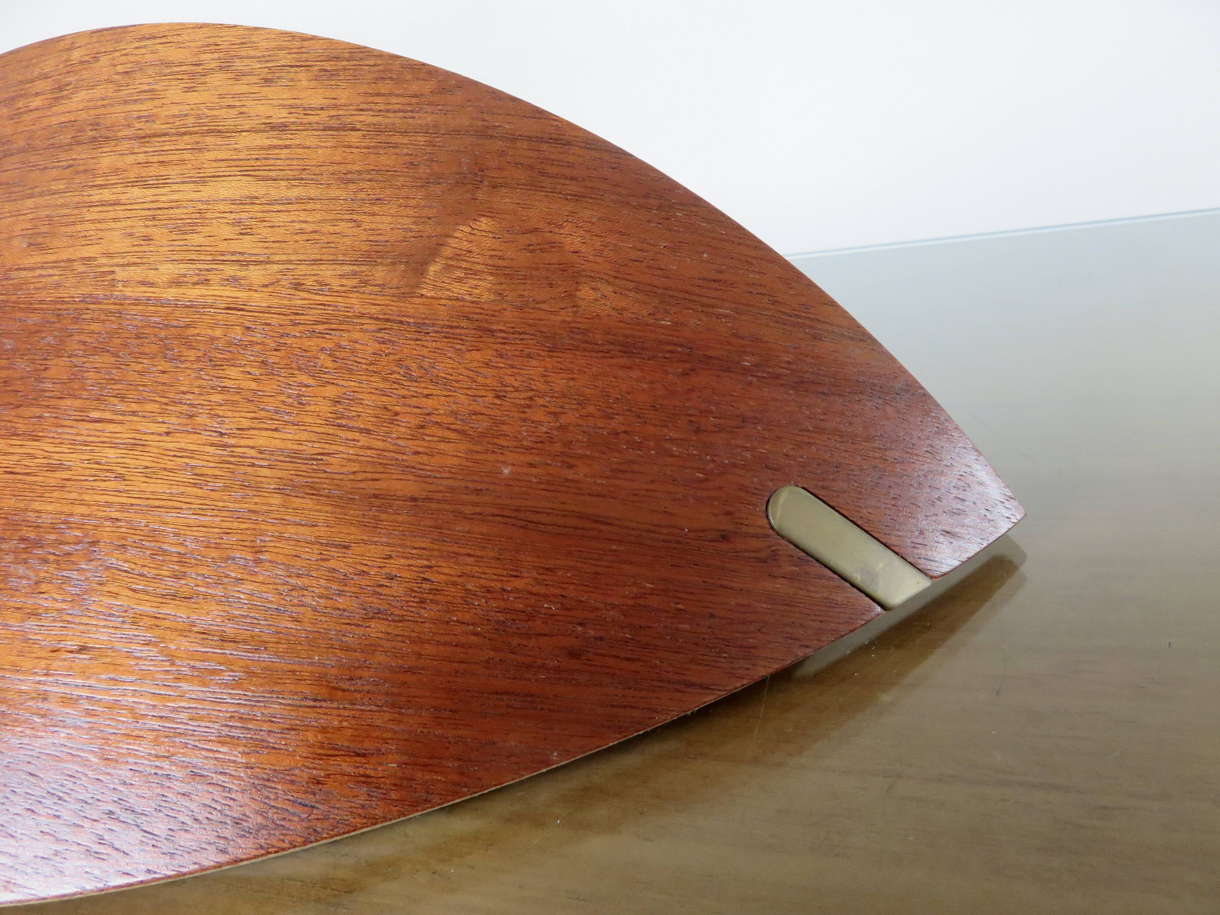 Pair of Scandinavian wall lights in bent wood with brass accents, 1980.