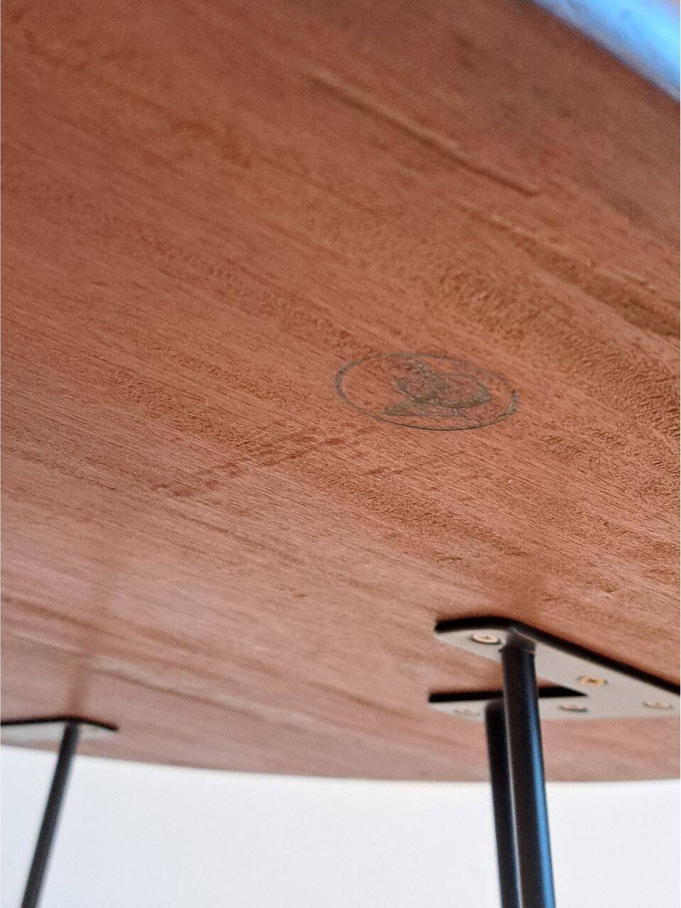 Round coffee table with mahogany wood top