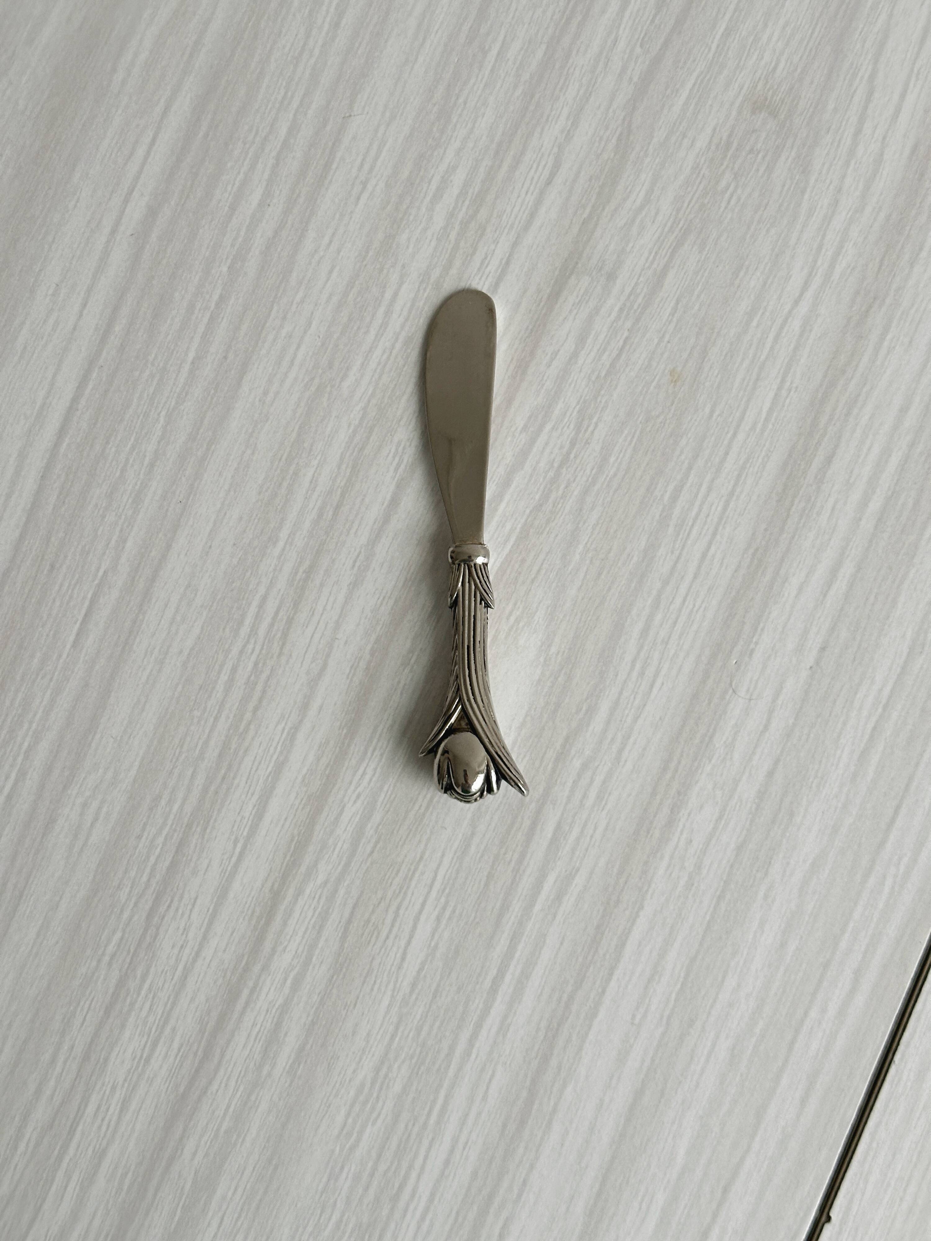 silver-plated cutlery with tulip design