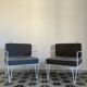 Vintage white metal Croisette style armchairs with hairpin legs in superb condition