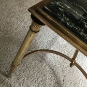 Gold bronze and marble coffee table, tapered feet decorated with Egyptian capitals