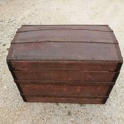 Old bombed travel trunk