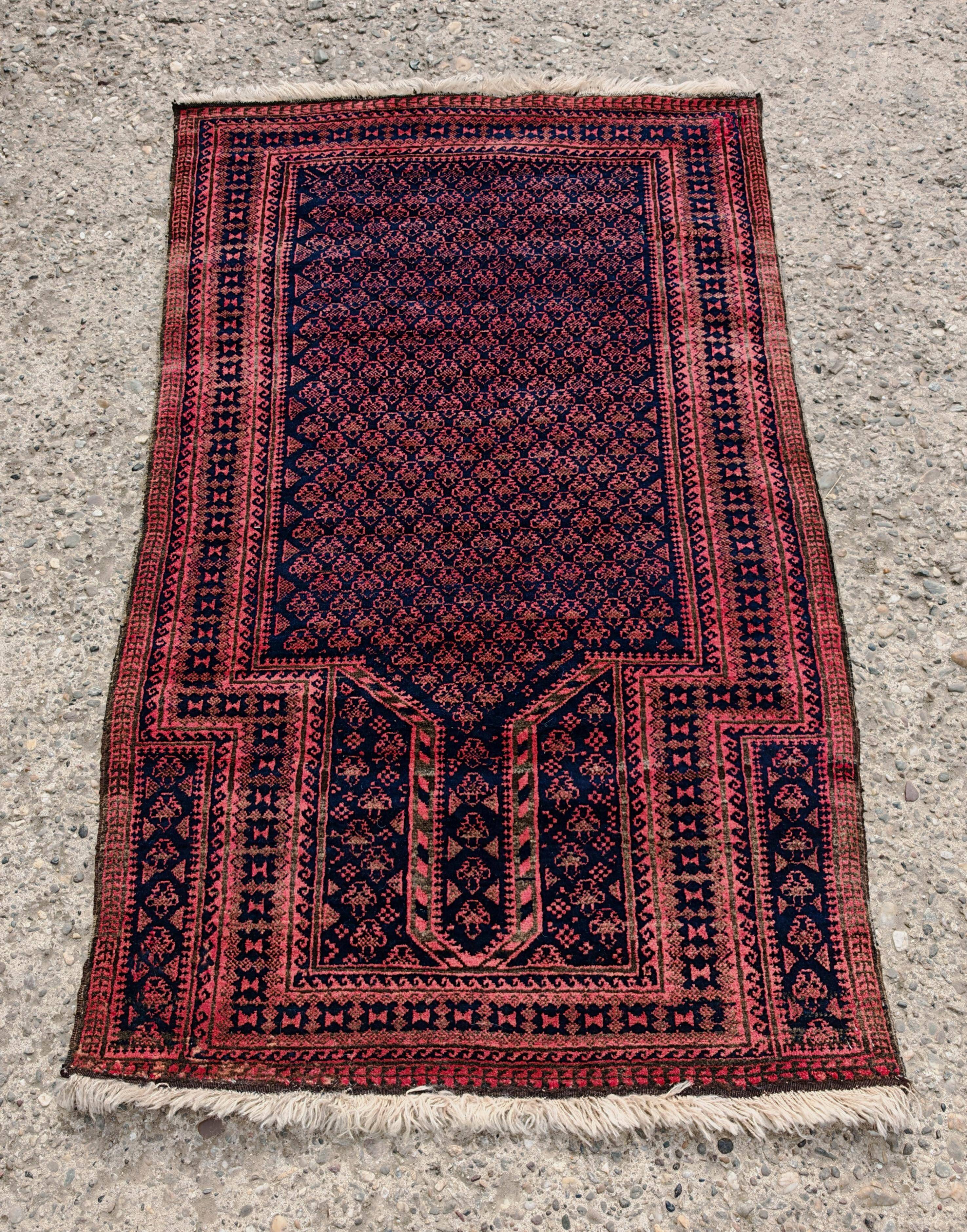 Vintage Persian Baluch prayer rug in wool from the 1950s.