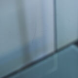 Glass table with shelf in frosted glass