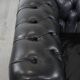 Set consisting of a chesterfield sofa and armchair made of cowhide leather