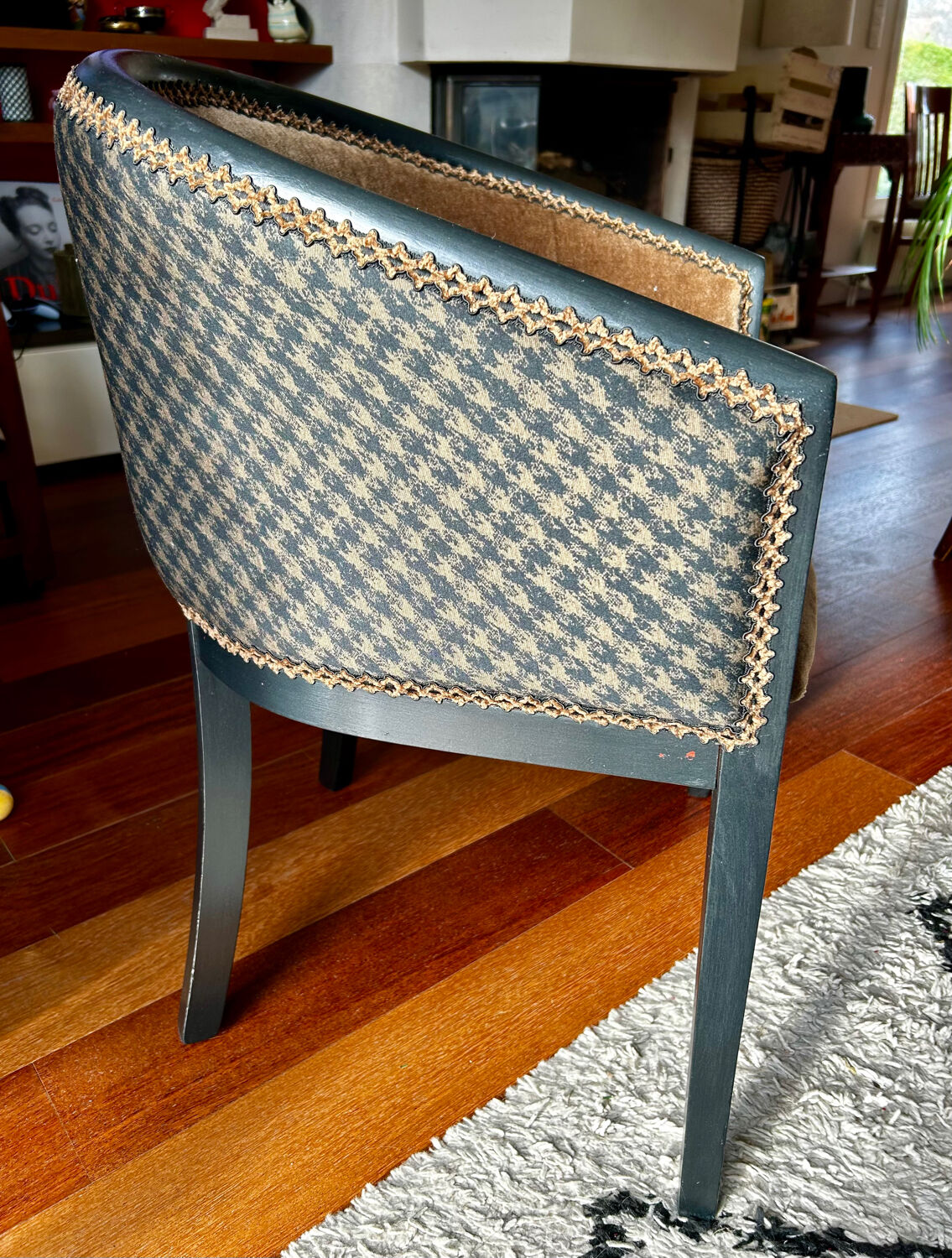 Pair of Art Deco barrel chairs in black and bronze